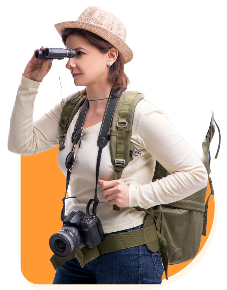 Western women birdwatching with binoculars in Colombia.