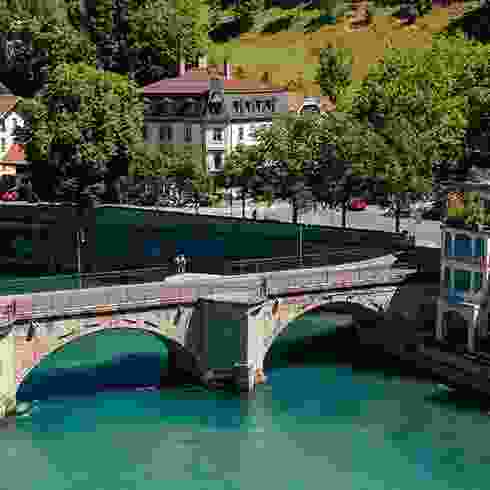 Scottish architecture and a pristine river with gothic bridge.