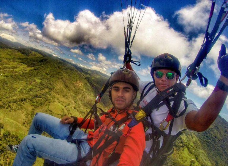 Soaring above Colombia’s vibrant landscapes while paragliding.